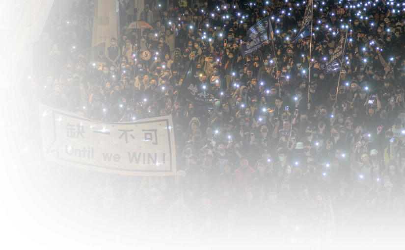 Image of Hong Kong Protester waiving flash lights